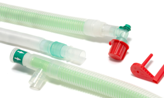 Using a Uniflow breathing system leak tester
